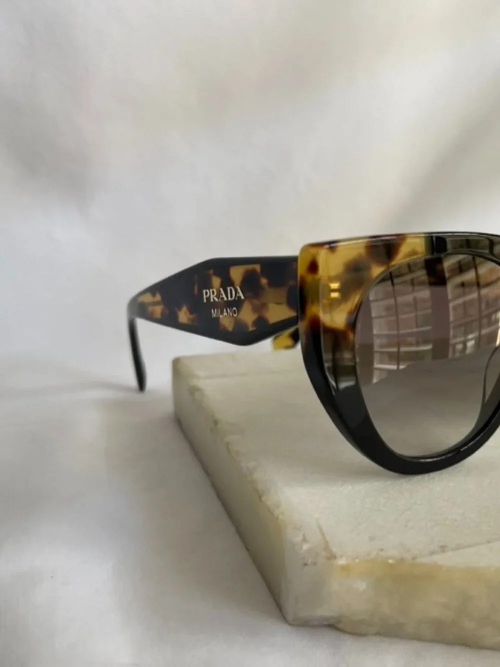 Prada, Milano, Tortoise and black women's sunglasses